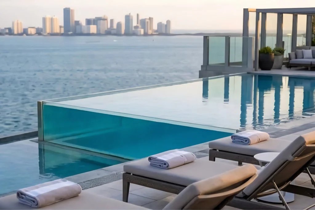 A glass-edged infinity pool overlooking the lagoon and the Lagos skyline